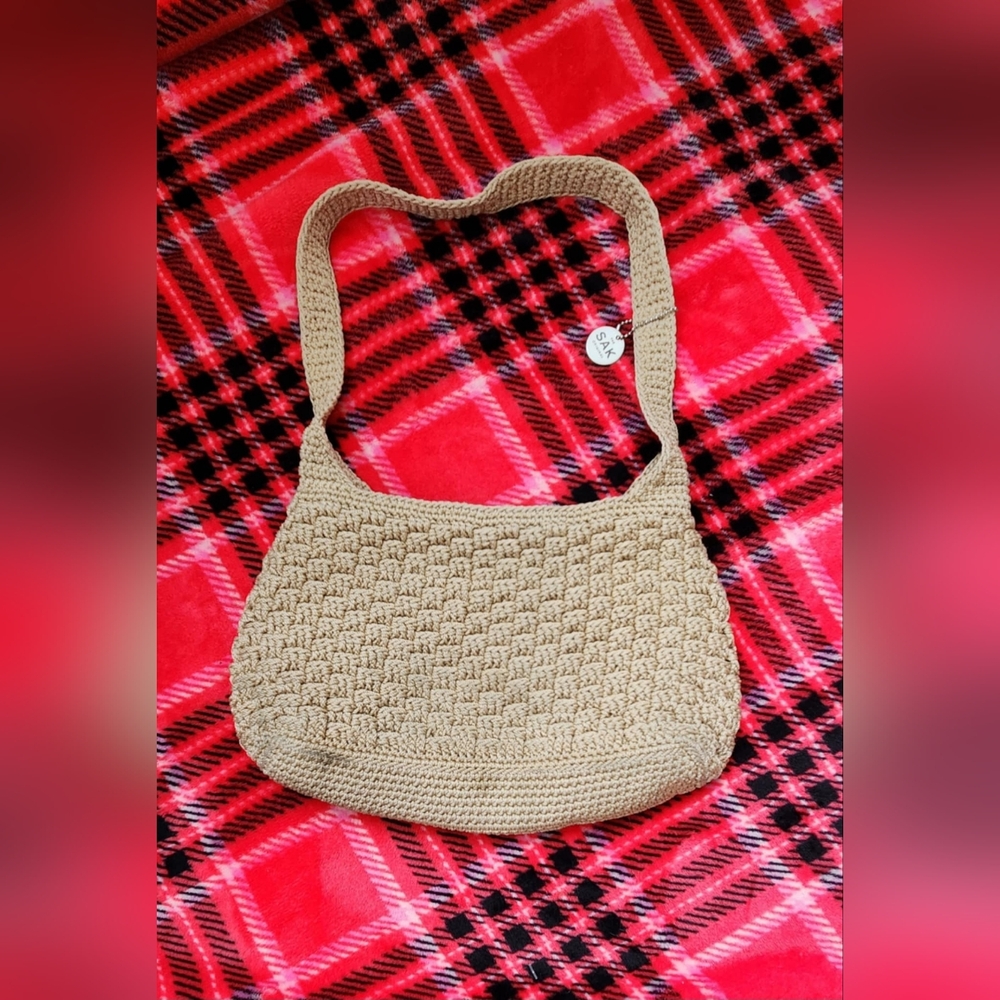 The sak purse Beige Made In Indonesia.
